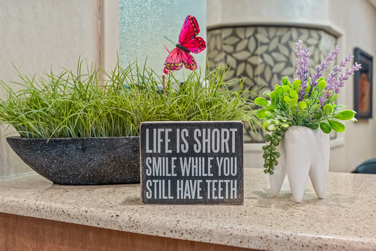 “Life is short, smile while you still have teeth” decor